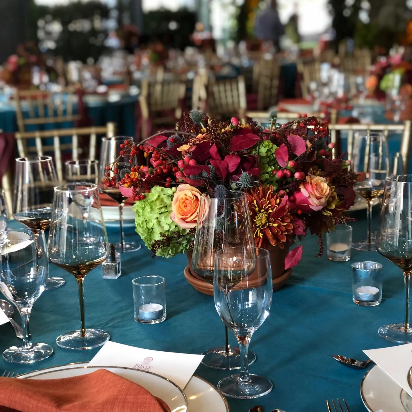 Romantic wedding reception with floral decorations and soft lighting